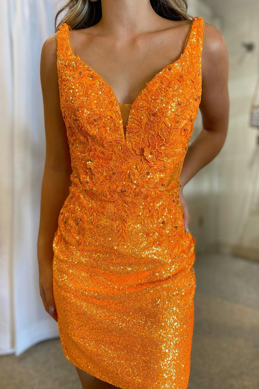 Stylish Bodycon V Neck Orange Sequins Short Homecoming Dress with Appliques